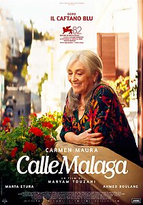 Locandina di Calle Málaga: Carmen Maura sorridente affacciata al balcone tra i gerani rossi, sullo sfondo i vicoli di Tangeri